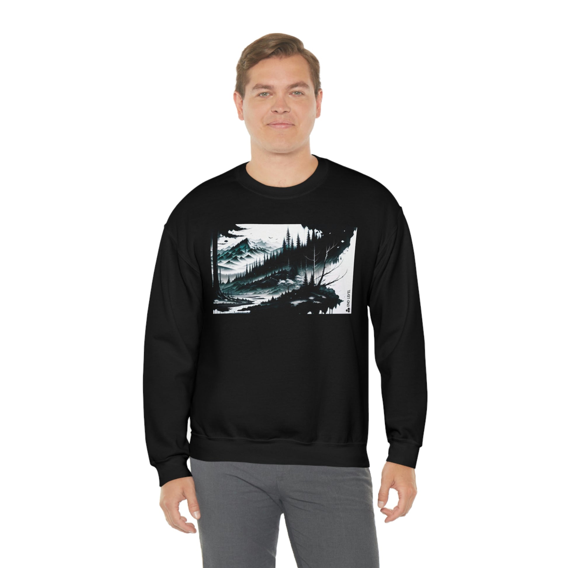 Man wearing black Grim Peak sweatshirt with grey pants.