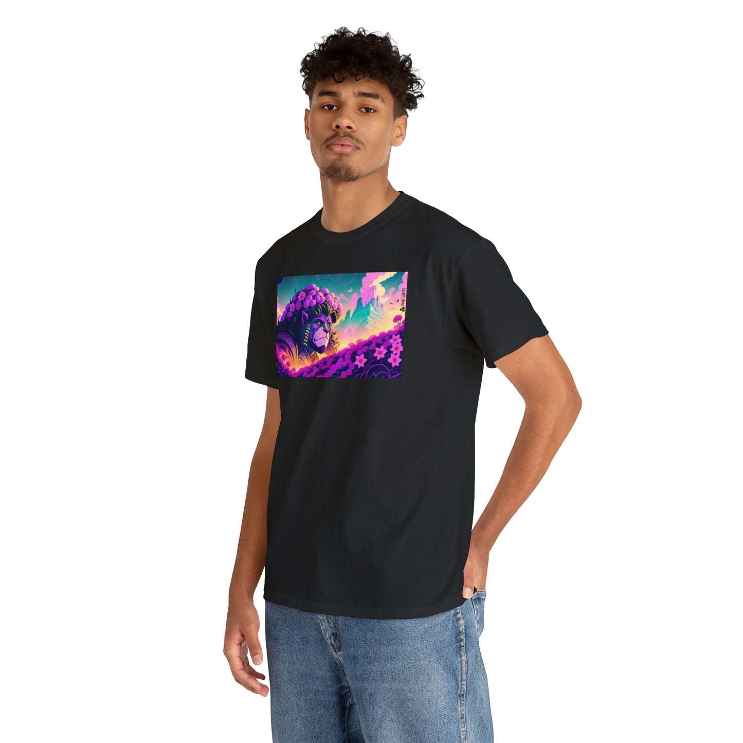 Man wearing black King Blossom tee with hand in back pocket.