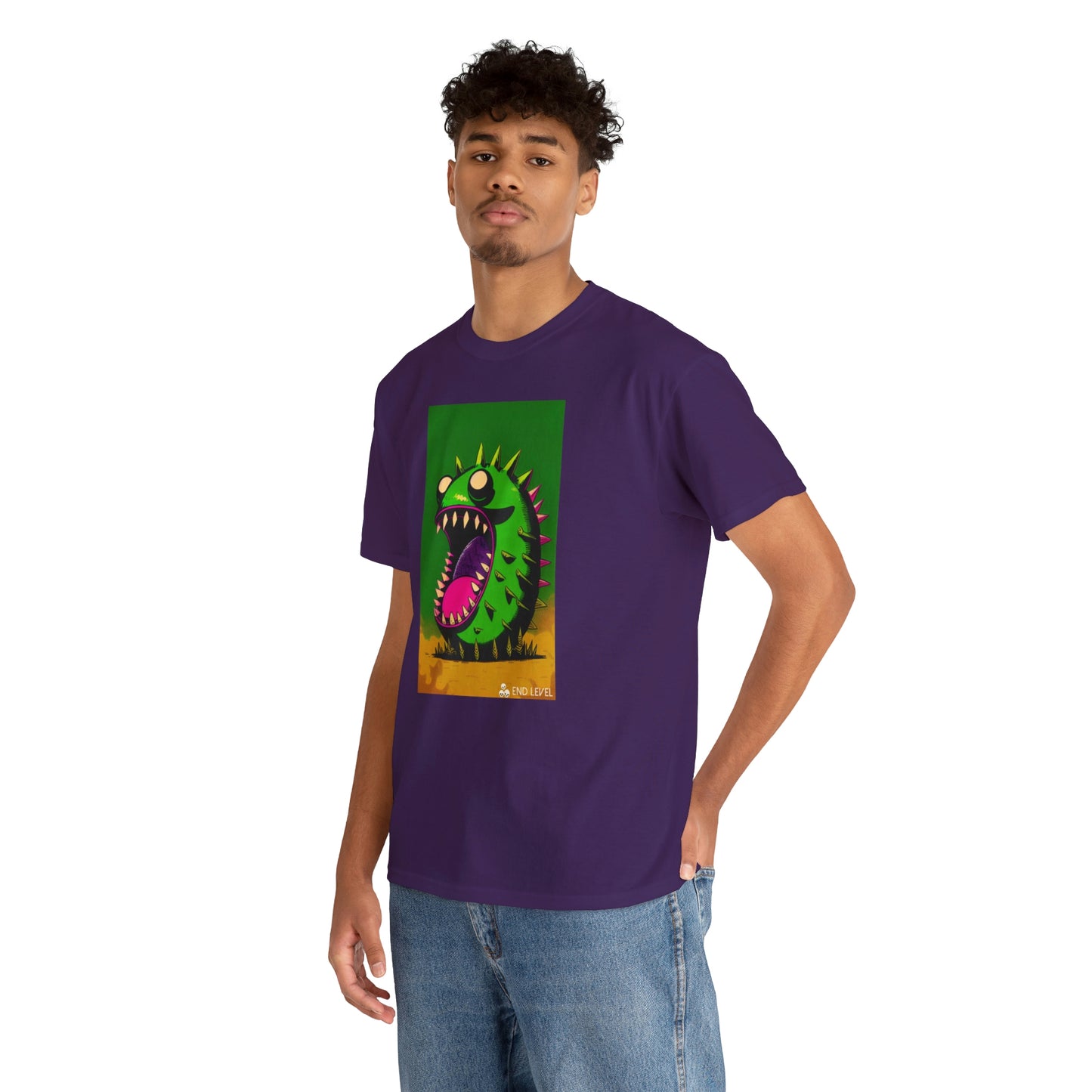 Man wearing Mighty Zook purple tee with hand in back pocket.