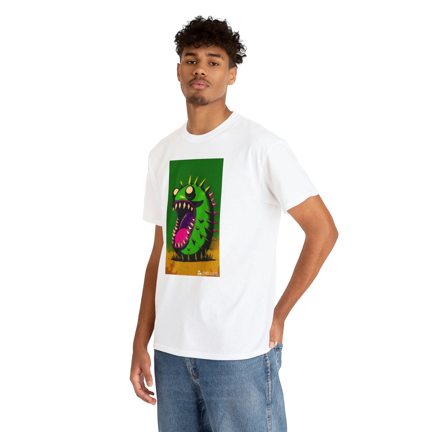 Man wearing Mighty Zook white tee with hand in back pocket.