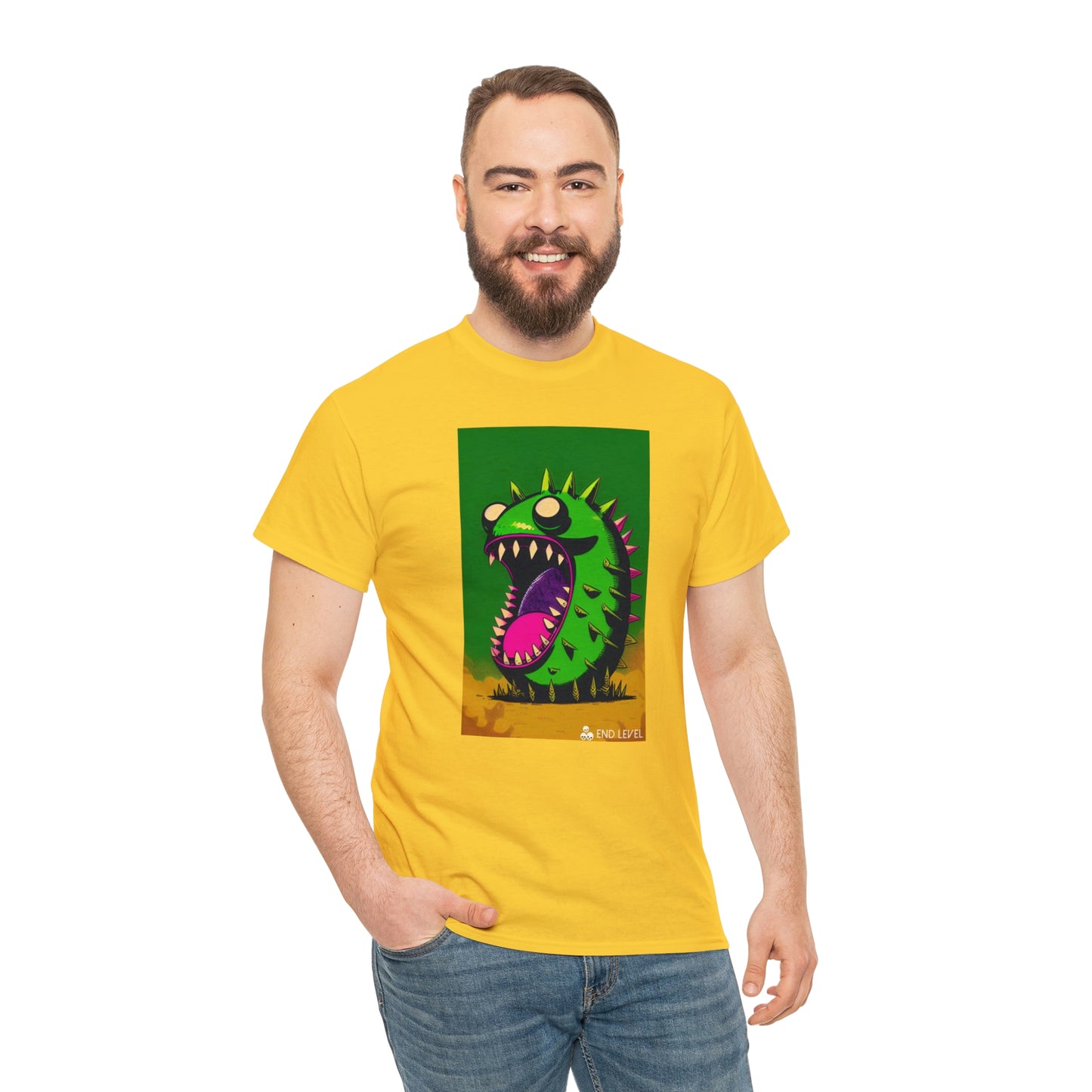 Man wearing Mighty Zook yellow tee with hand in right pocket.