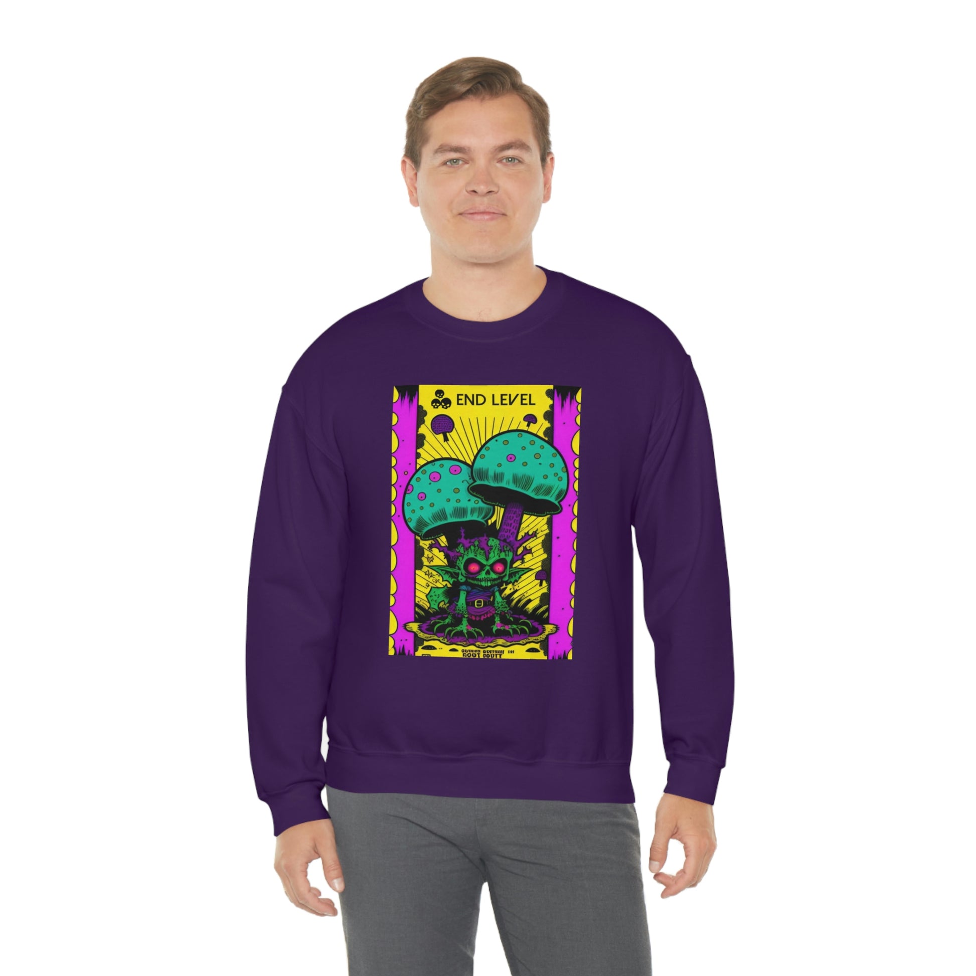 Man wearing purple Tea Time sweatshirt with grey pants.