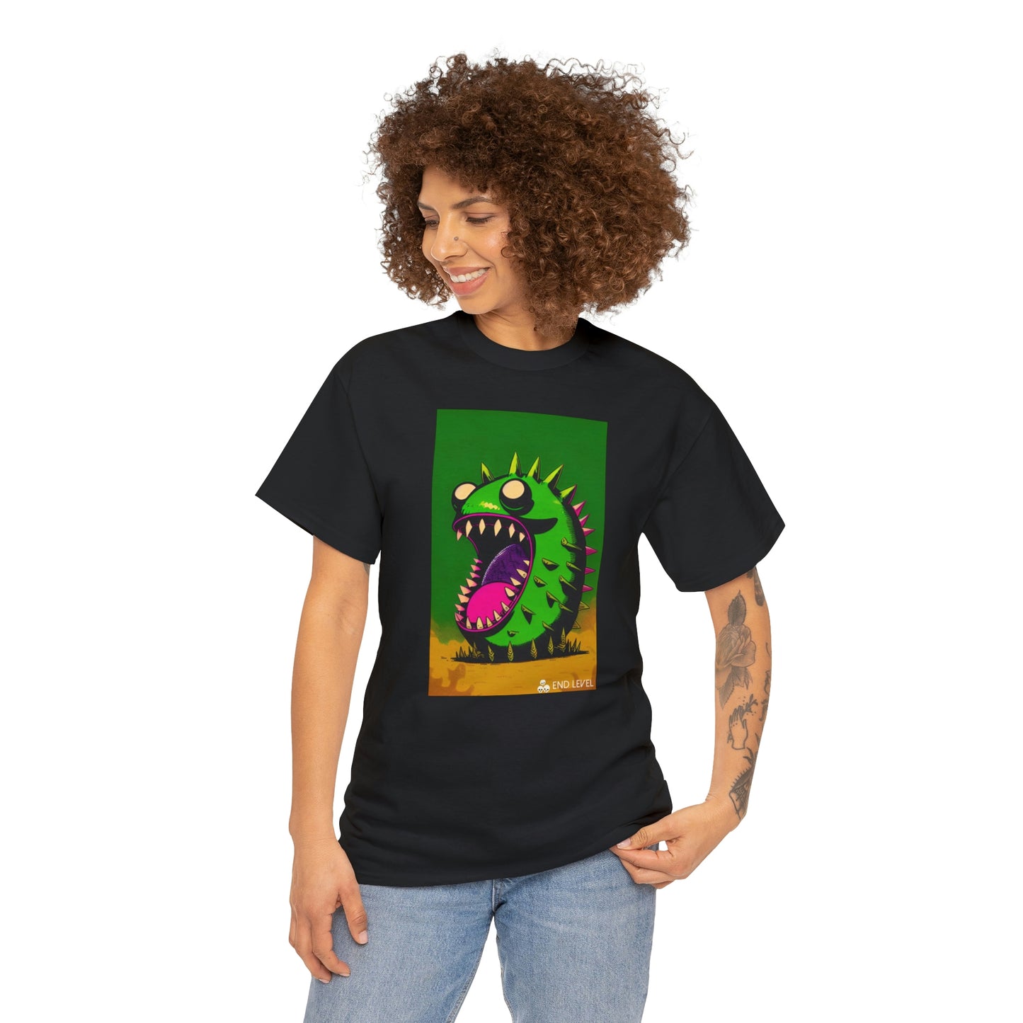 Woman wearing Mighty Zook black tee looking to the right with hand on left hip.