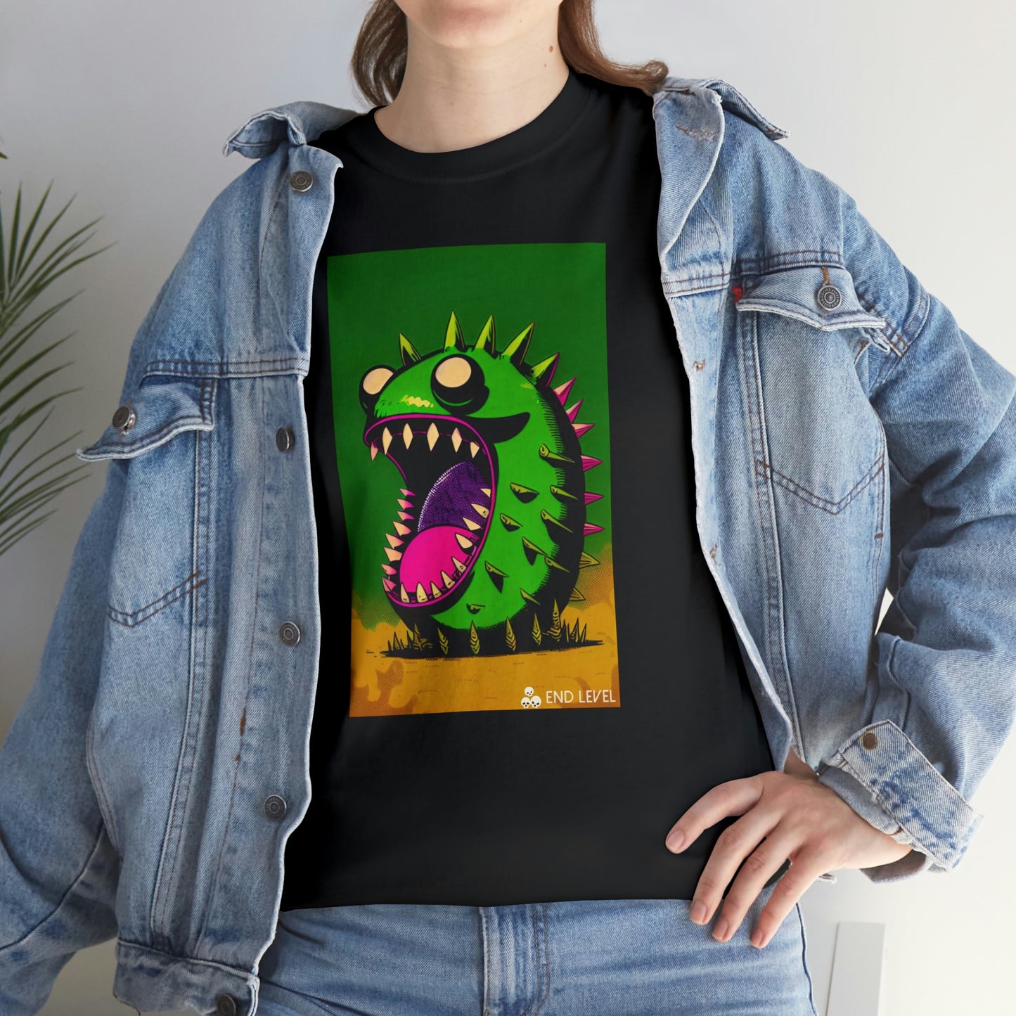 Woman wearing Mighty Zook design black tee with hand on hip.