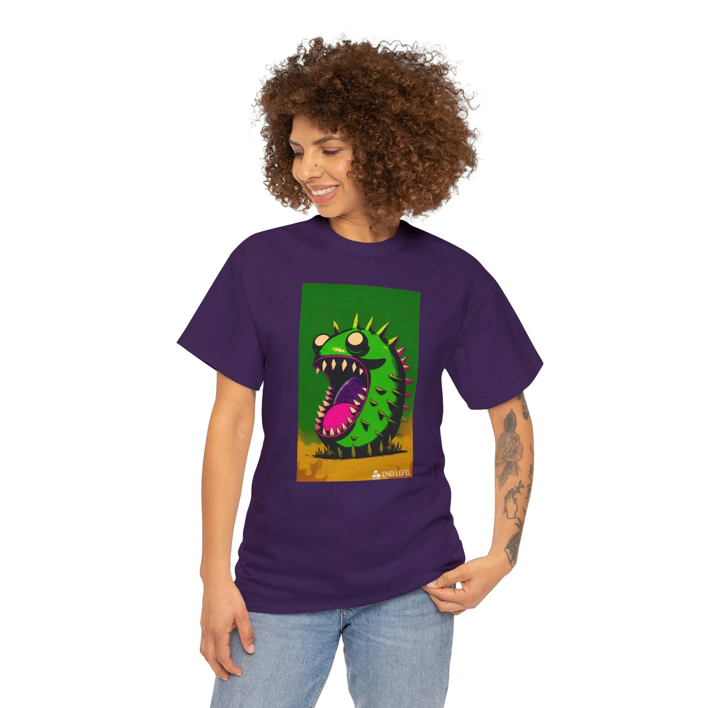 Woman wearing Mighty Zook purple tee looking to the right with hand on left hip.