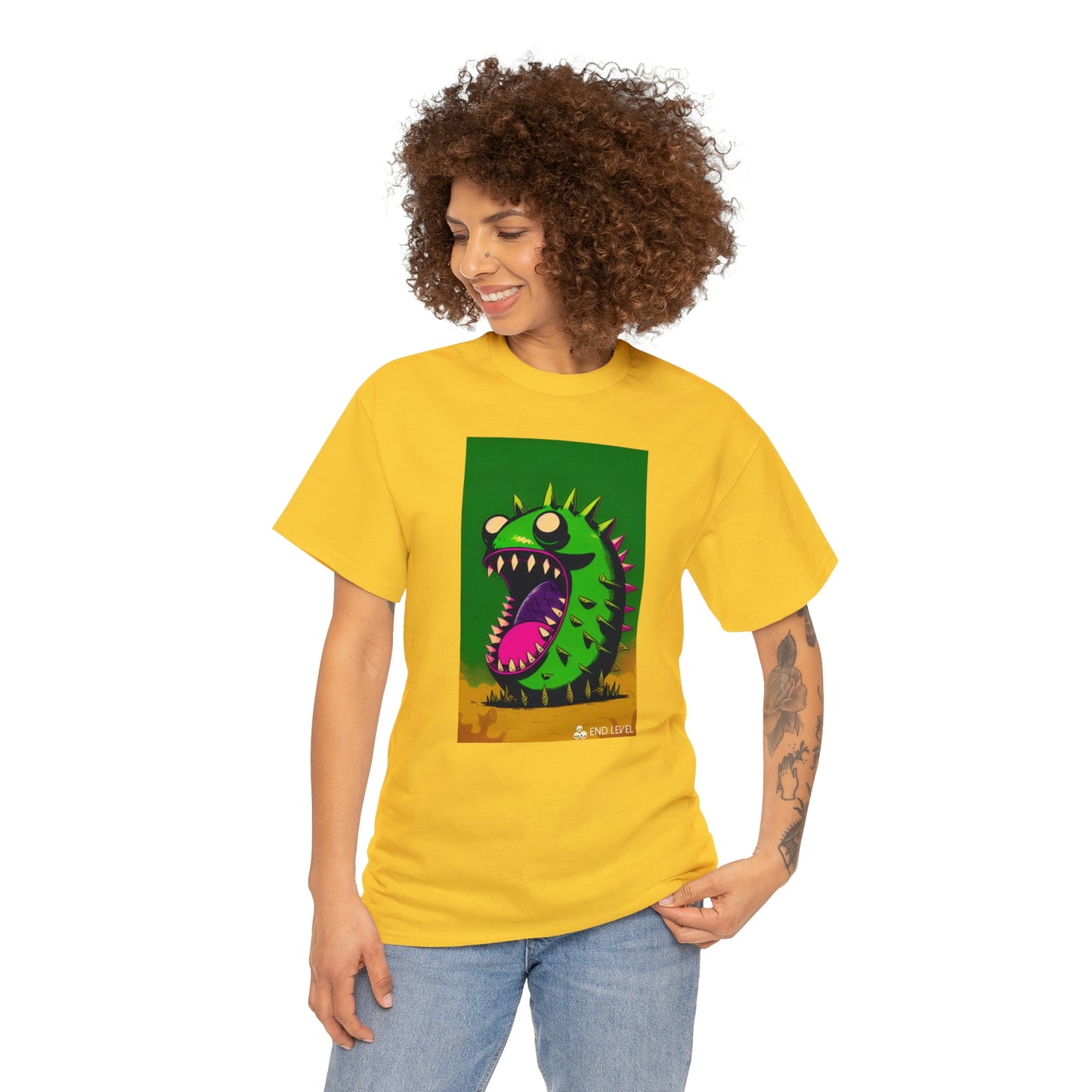 Woman wearing Mighty Zook yellow tee looking to the right with hand on left hip.