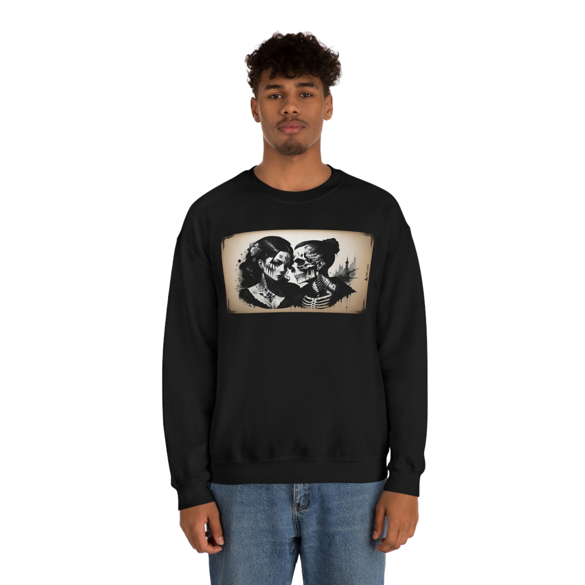 Man wearing Love Eternal black sweatshirt with blue jeans.