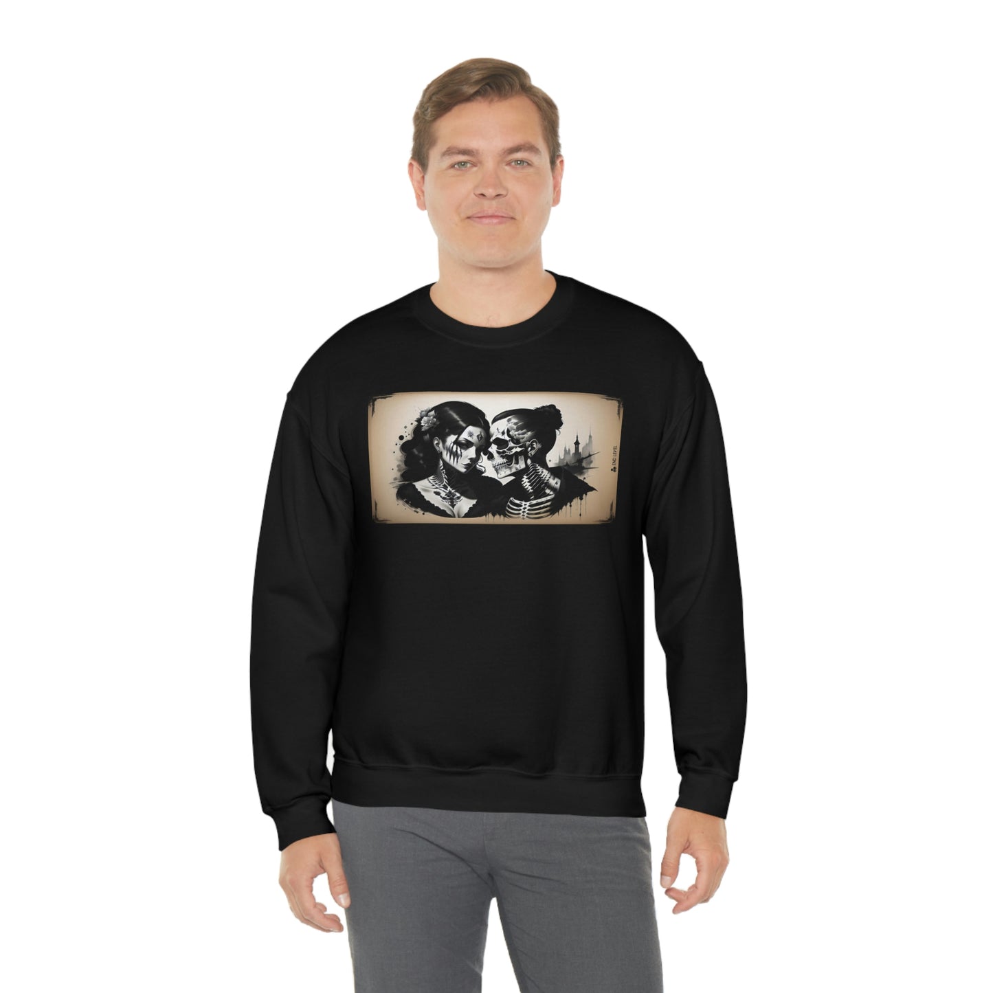 Man wearing Love Eternal black sweatshirt with grey pants.