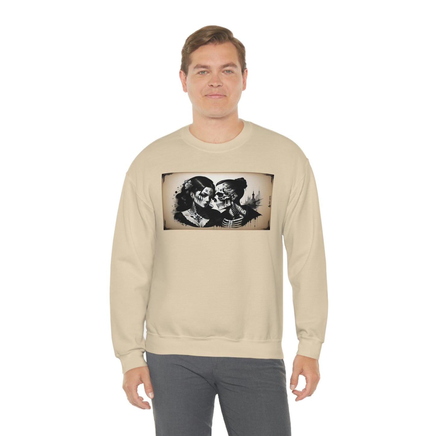 Man wearing Love Eternal white sweatshirt with grey pants.