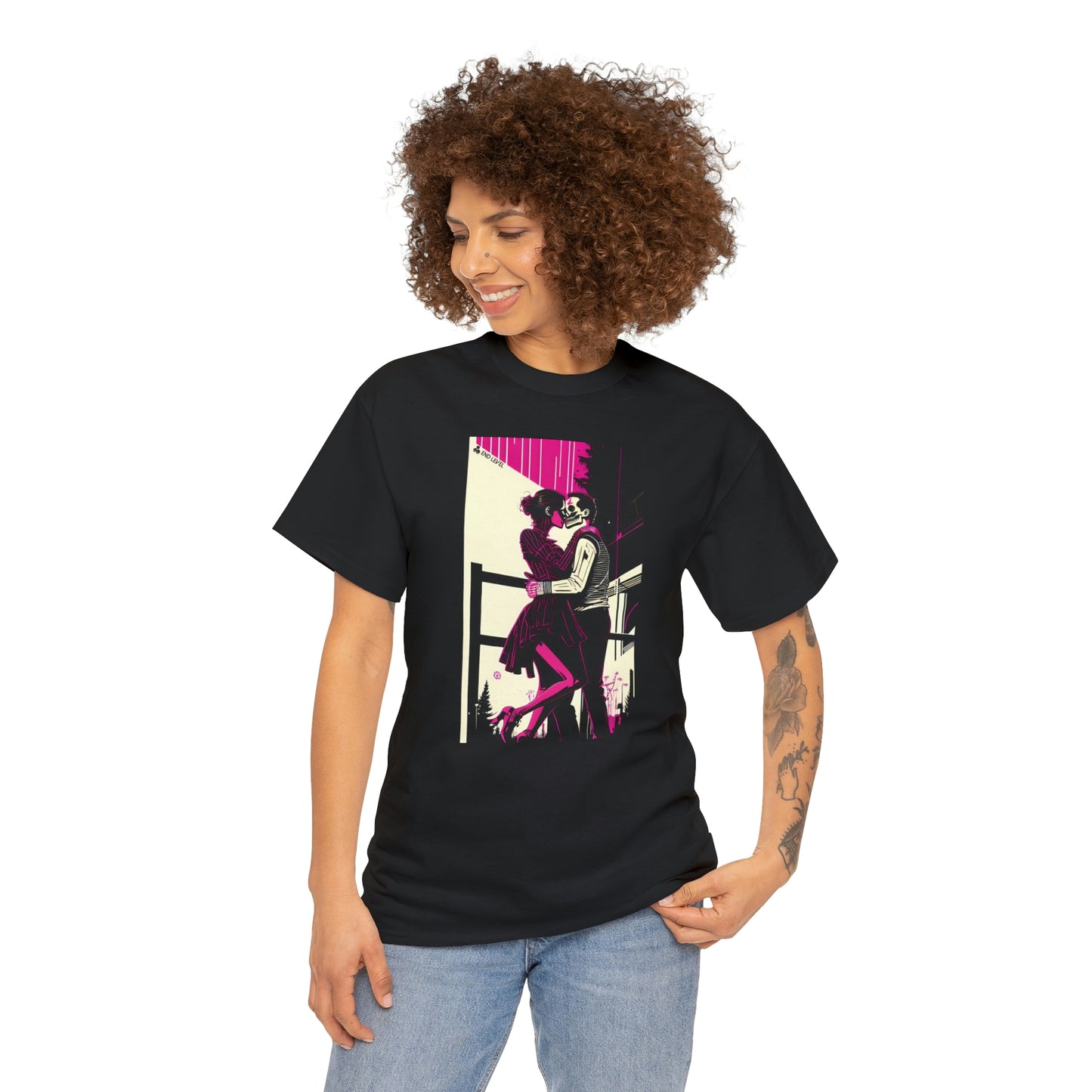 Woman wearing Deadly Romance black tee looking to the right with hand on left hip.