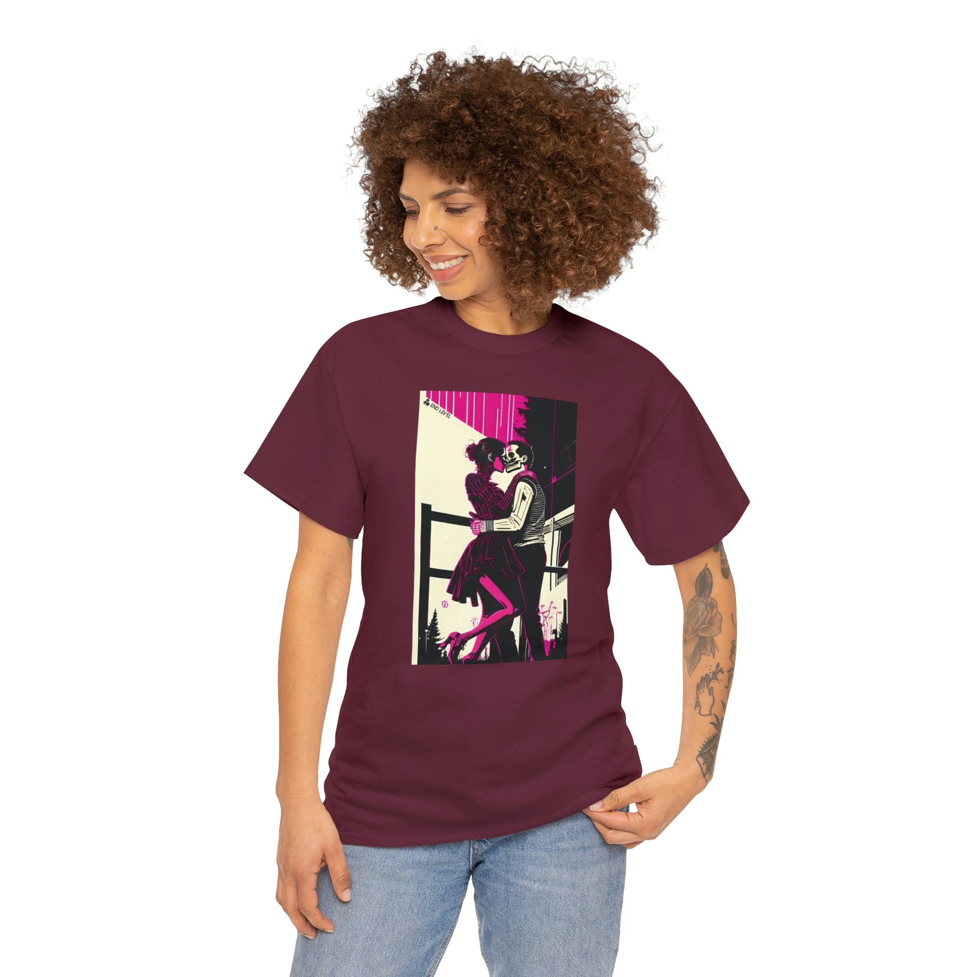 Woman wearing Deadly Romance maroon tee looking to the right with hand on left hip.