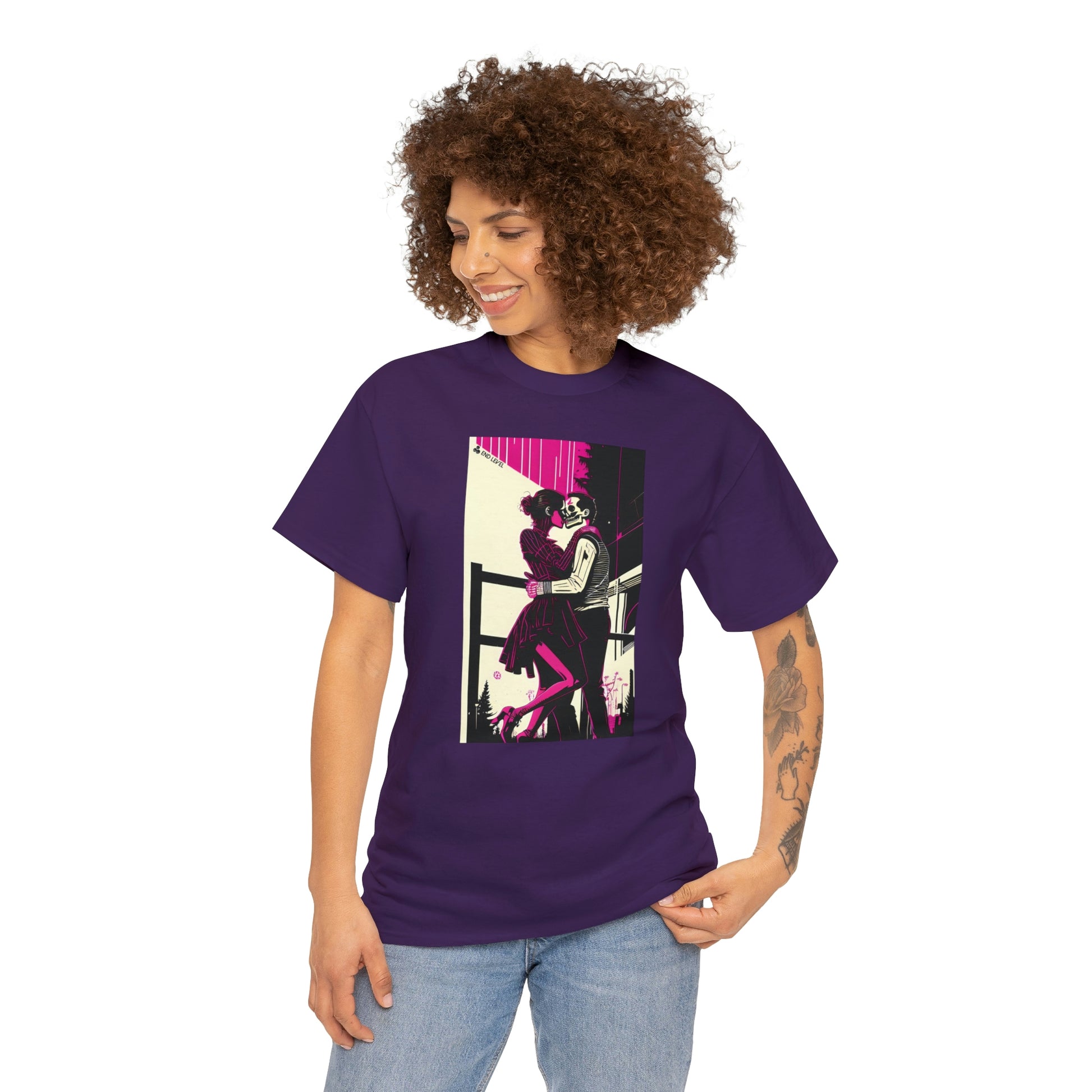 Woman wearing Deadly Romance purple tee looking to the right with hand on left hip.