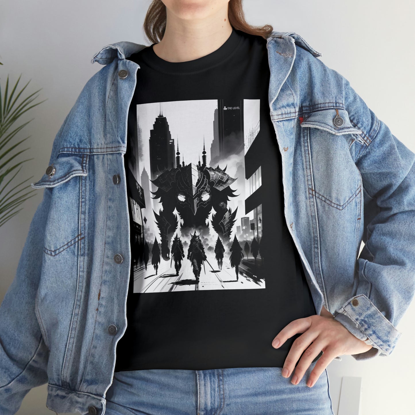 Woman wearing Invasion black tee with hand on hip.