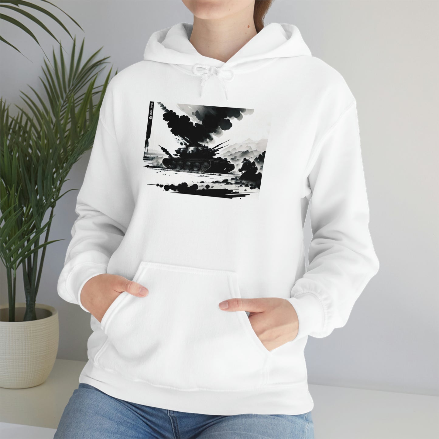 Woman sitting beside plant wearing white Smoke hoodie.